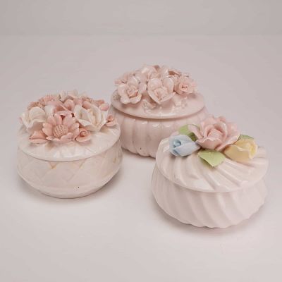 3pc Porcelain Floral Encrusted Lidded Trinket Boxes. This collection consists of three porcelain 