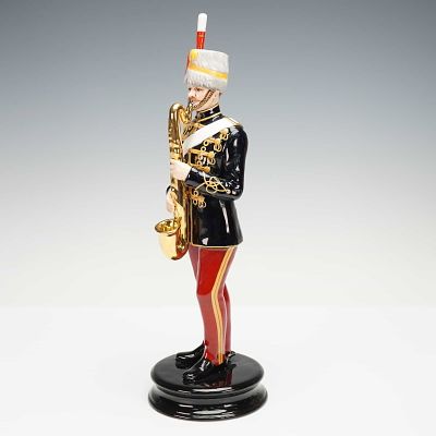 Michael Sutty Porcelain Sculpture, 11th Hussars. A hand painted porcelain figure showing a 