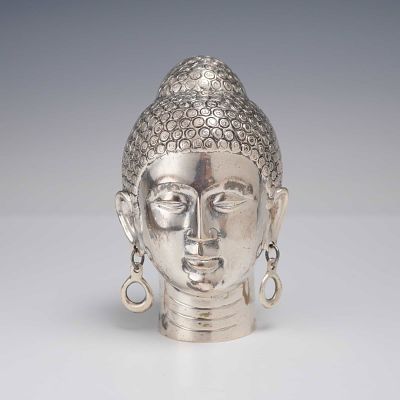 Southeast Asian Style 900 Silver Buddha Head Sculpture. This hollow-cast sculpture depicts the 