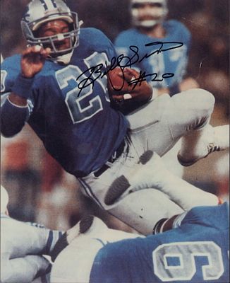 Billy Sims Autographed Detroit Lions Action Photograph, Unauthenticated. This lot features a 