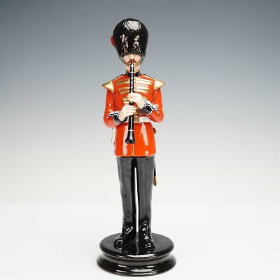 Michael Sutty Porcelain Figurine, Coldstream Guards. Hand painted porcelain figurine depicting a 