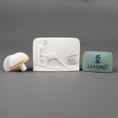 Lladro Collectors Society Signs and Centurion Hall Bottle Stopper. A three-piece Lladro grouping 