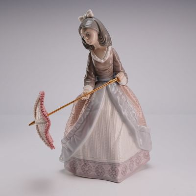 Lladro Porcelain Figurine Jolie 01005210. A Lladro porcelain figurine titled Jolie, designed by 