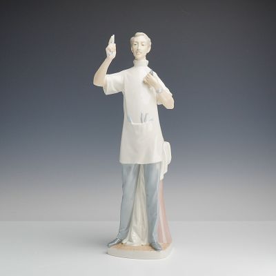 Lladro Porcelain Figurine, Dentist 1004762. The figure depicts a standing male dentist in 