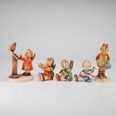 Set of Five Goebel Hummel Ceramic Figurines. This collection of five hand-painted ceramic 