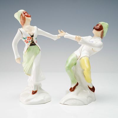 Pair of Michael Sutty Porcelain Figurines, Harlequin and Columbine. Pair of porcelain figurines 