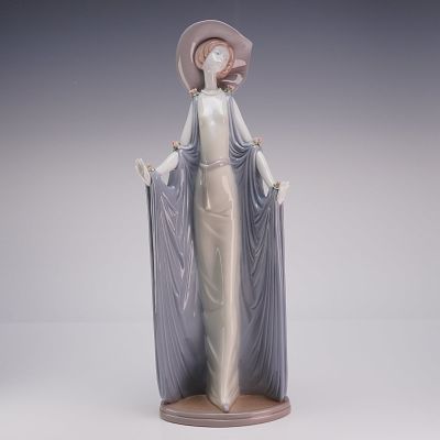 Lladro Porcelain Figurine Afternoon Tea 01001428. A glazed porcelain figurine produced by Lladro 