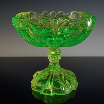 Victorian Style Ornate Pressed Uranium Glass Dish. This ornate standing glass dish is 