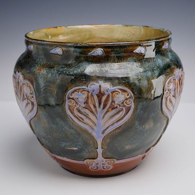 Doulton Lambeth Art Nouveau Jardiniere. This stoneware jardiniere features a squat, bulbous form 