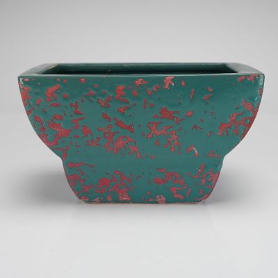 McCoy Brocade Green and Pink Ceramic Planter. A single ceramic planter, McCoy Pottery, featuring 