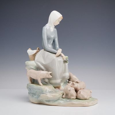 Lladro Porcelain Figurine Girl with Piglets 01004572. This Lladro porcelain figurine was 