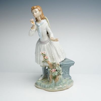 Lladro Porcelain Figurine Exquisite Scent 01001313. The figure depicts a young girl standing 