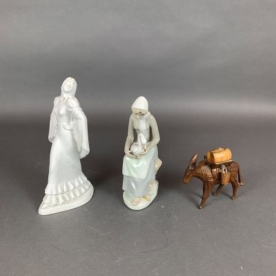 3pc Porcelain and Wood Figurines. This collection includes three decorative figurines. The first 