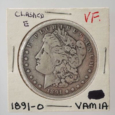 1891-O Morgan Silver Dollar. Struck at the New Orleans Mint, this silver dollar features the 
