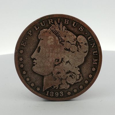 1893-O US Morgan Silver Dollar. This US Morgan silver dollar is dated 1893 and was struck at the 
