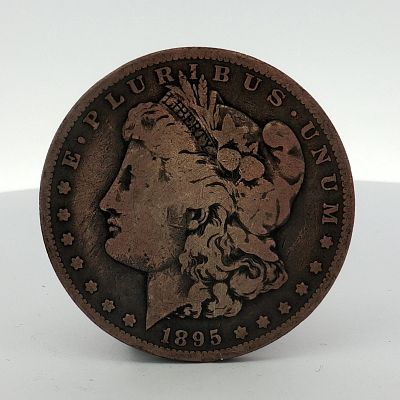 1895-O US Morgan Dollar. This United States Morgan dollar coin is dated 1895 and features the 