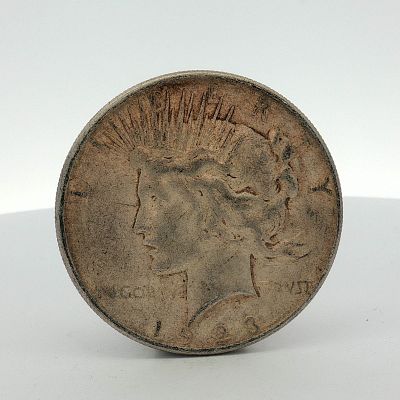1923-S US One Dollar Peace Silver Dollar Coin, Circulated. US Peace silver dollar, dated 1923. 