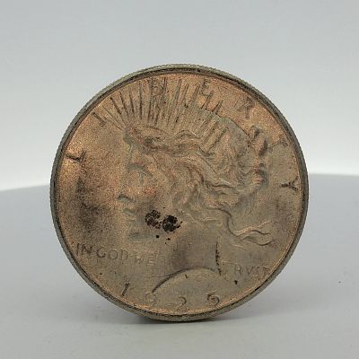 1925-S US One Dollar Peace Silver Dollar Coin, Circulated. This US 1925-S Peace silver dollar 