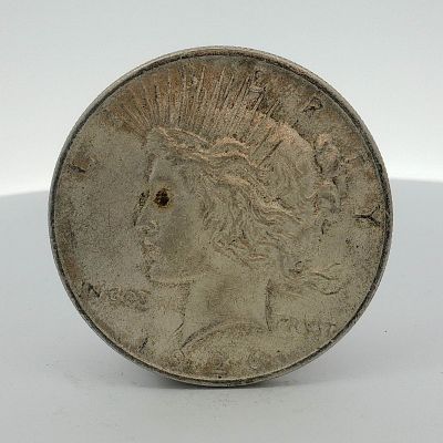 1926-D US One Dollar Peace Silver Dollar, Circulated. This 1926-D US Peace silver dollar was 
