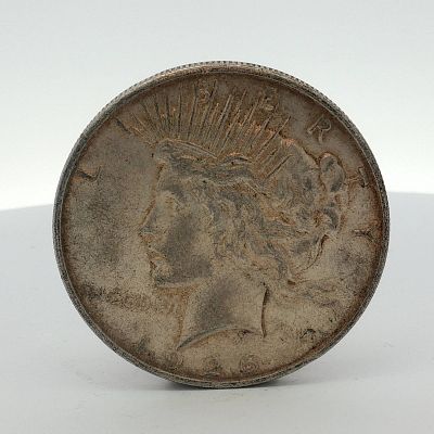 1926-D US One Dollar Peace Silver Dollar, Circulated. This US Peace silver dollar was struck at 