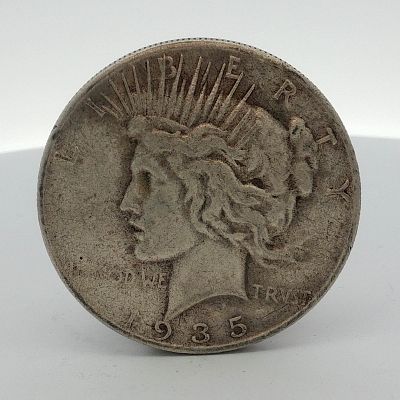 1935-S US One Dollar Peace Silver Dollar Coin, Circulated. US 1935-S Peace silver dollar struck 