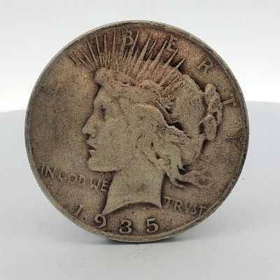 1935-S US One Dollar Peace Silver Dollar Coin, Circulated. US 1935-S Peace silver dollar. Struck 