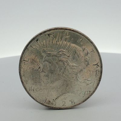 1923 US Peace Silver Dollar. This is a 1923 US Peace silver dollar struck at the Philadelphia 