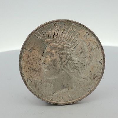 1923 US Peace Silver Dollar. This 1923 US Peace silver dollar is a struck 90% silver coin 