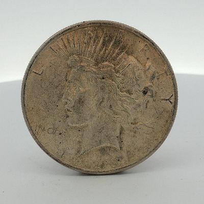 1923 US Peace Silver Dollar. This 1923 US Peace silver dollar is struck in 90 percent silver and 