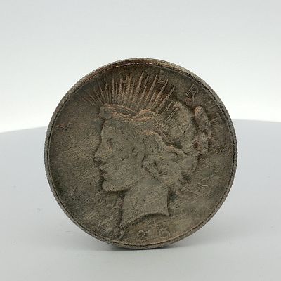 1925 US Peace Silver Dollar. This 1925 US Peace silver dollar is composed of 90% silver and 10% 