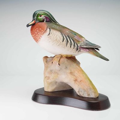 Cybis Porcelain Figurine on Wooden Base, Wood Duck 456. The bird is depicted in a naturalistic 