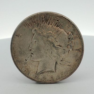 1923-S US Peace Silver Dollar. This 1923-S US Peace silver dollar is composed of 90% silver and 