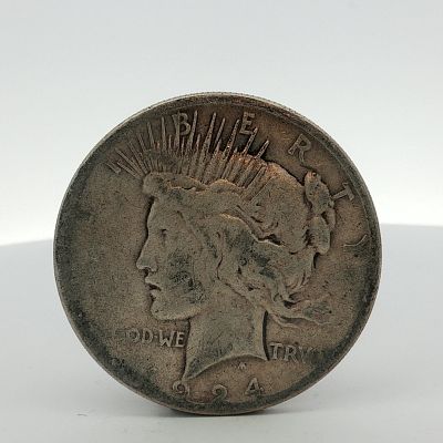1924-S US One Dollar Peace Silver Dollar Coin, Circulated. US 1924-S Peace Silver Dollar. This 
