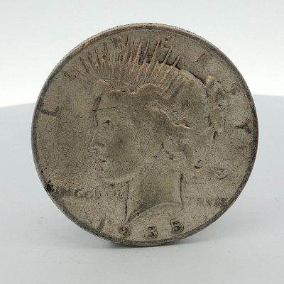 1935-S US Peace Silver Dollar. A United States Peace silver dollar struck at the San Francisco 