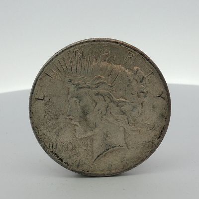 US Silver Peace Dollar. This struck US silver Peace Dollar is composed of .900 fine silver. The 