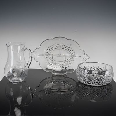 Three Pieces of Cut, Pressed, and Etched Glass Tableware. This collection consists of 3 glass 
