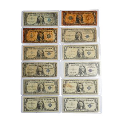 Twelve 1928 - 1957 US One Dollar Silver Certificate Bills. A collection of 12 United States 