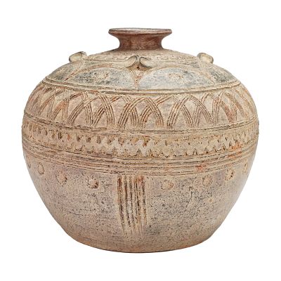Carved Tribal Motif Pottery Vase. This rounded earthenware vase features a flared neck and 