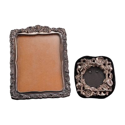 2pc Silver Plated & Toned Frames including Baroque by Wallace. This lot features two frames of 