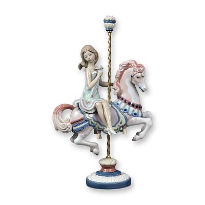 Lladro Porcelain Figurine Girl On Carousel Horse 0100469. A Lladro porcelain figurine titled 