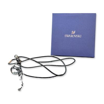 Swarovski 2022 SCS Crystal Elephant Pendant Necklace. The faceted dark gray crystal elephant is 