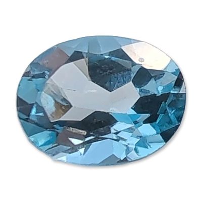 Oval Light Blue Topaz Gemstone. Loose oval faceted Topaz gemstone. Transparent light blue color 
