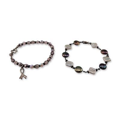 Two Sterling Silver Beaded Link Bracelets. Two sterling silver beaded link bracelets. The first 
