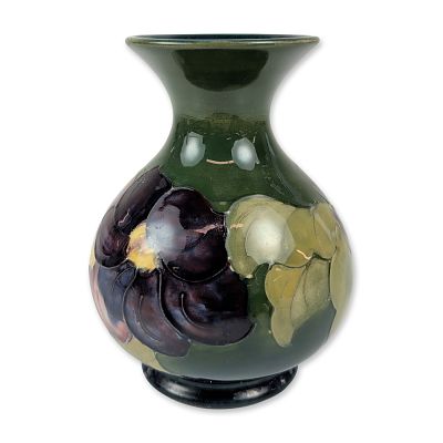 Moorcroft Small Tubelined Clematis Vase. Moorcroft bulbous vase in glazed earthenware, featuring 