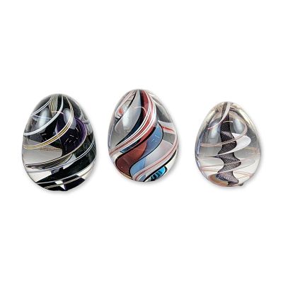 Three Studio Art Glass Egg Paperweights. Collection of three hand-blown studio glass egg-form 
