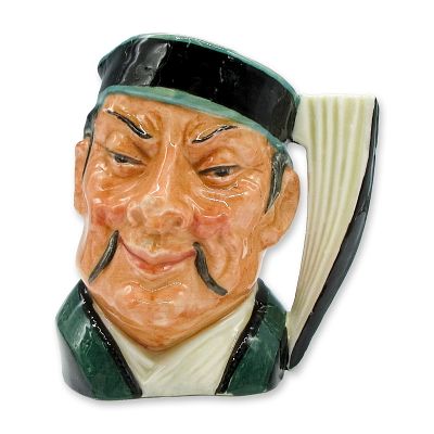Mikado D6507 - Small - Royal Doulton Character Jug. Black and turquoise hat; green and white 