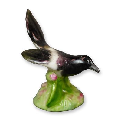 Royal Doulton Bone China Bird Figurine, Magpie K34. A hand-painted bird figure rendered in black 