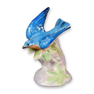 Royal Doulton Porcelain Bird Figurine, Bluebird with Lupins. Hand-painted figure of a bluebird 