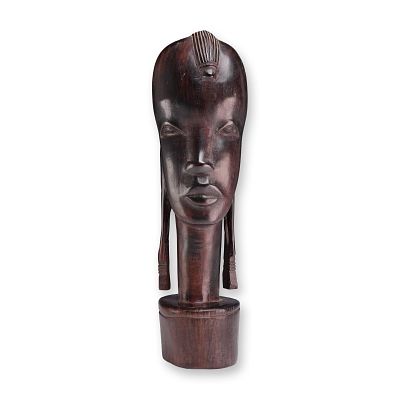 African Hand-Carved Ebony Wood Tribal Head Bust. This hand-carved wooden tribal head is a 