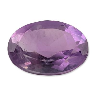 Oval Faceted Light Purple Amethyst. A loose faceted amethyst gemstone cut in an oval shape. The 